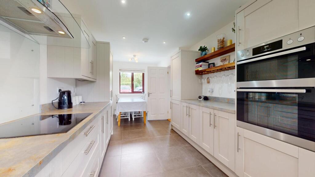 EXTENDED THROUGH KITCHEN/DINING ROOM