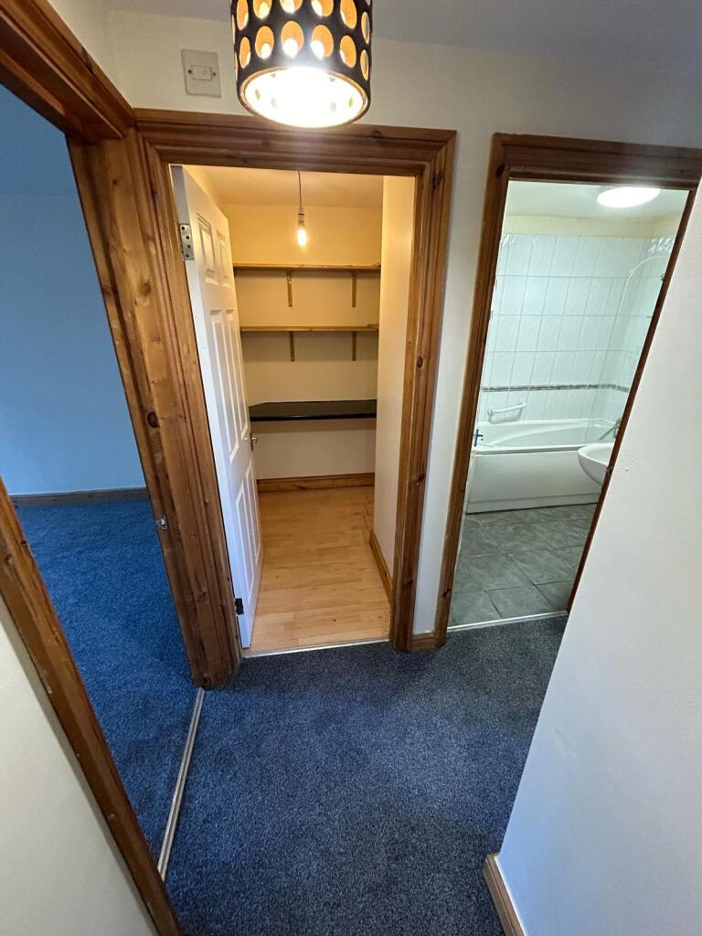 Bright and clean bathroom featuring a spacious ...