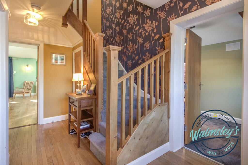 Entrance hallway with spacious home office_