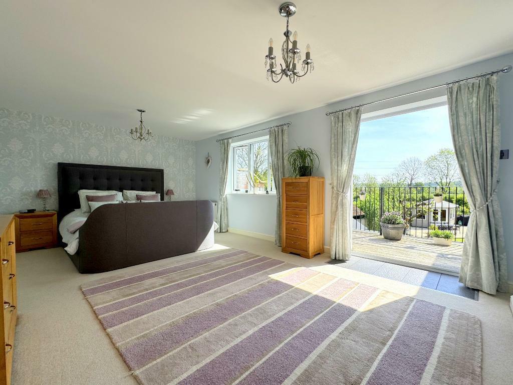 Master bedroom with balcony