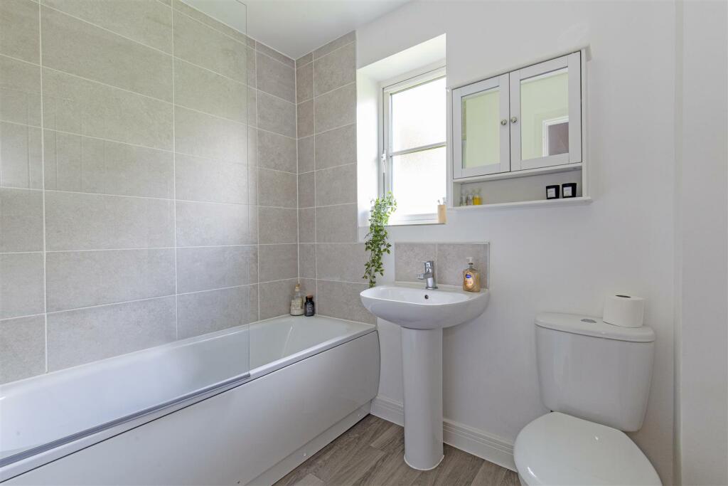 Partly Tiled Family Bathroom