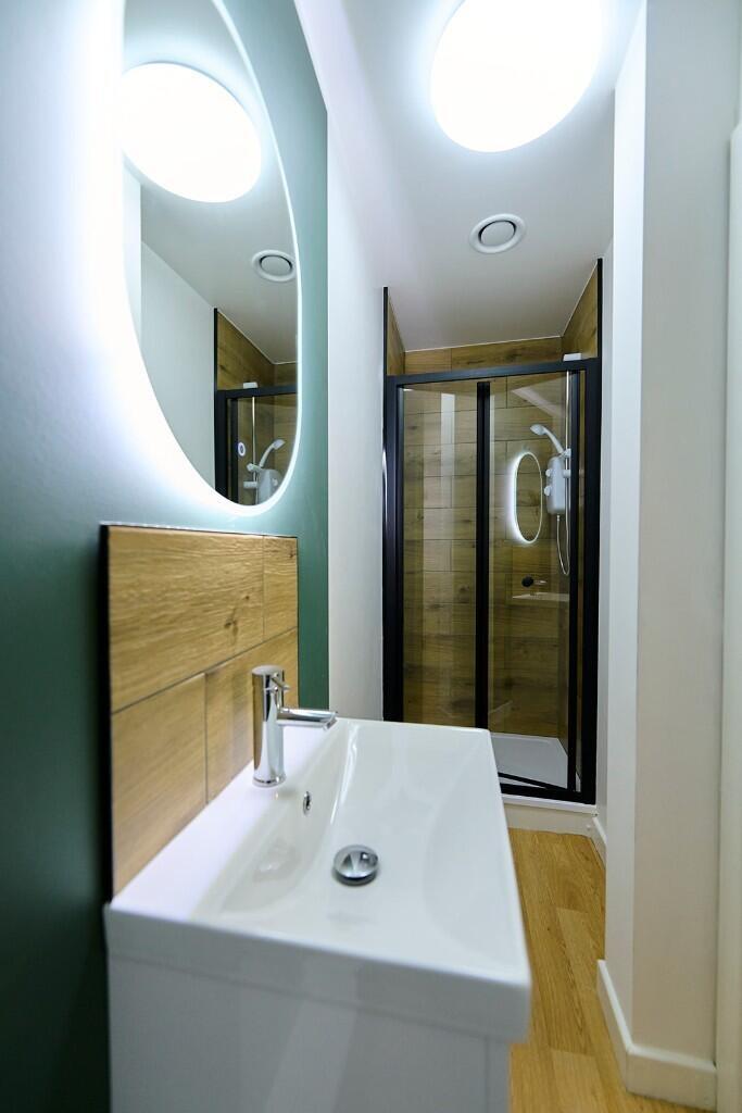 A modern and well-maintained bathroom featuring...