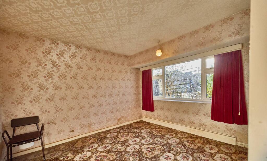 FRONT BEDROOM ONE
