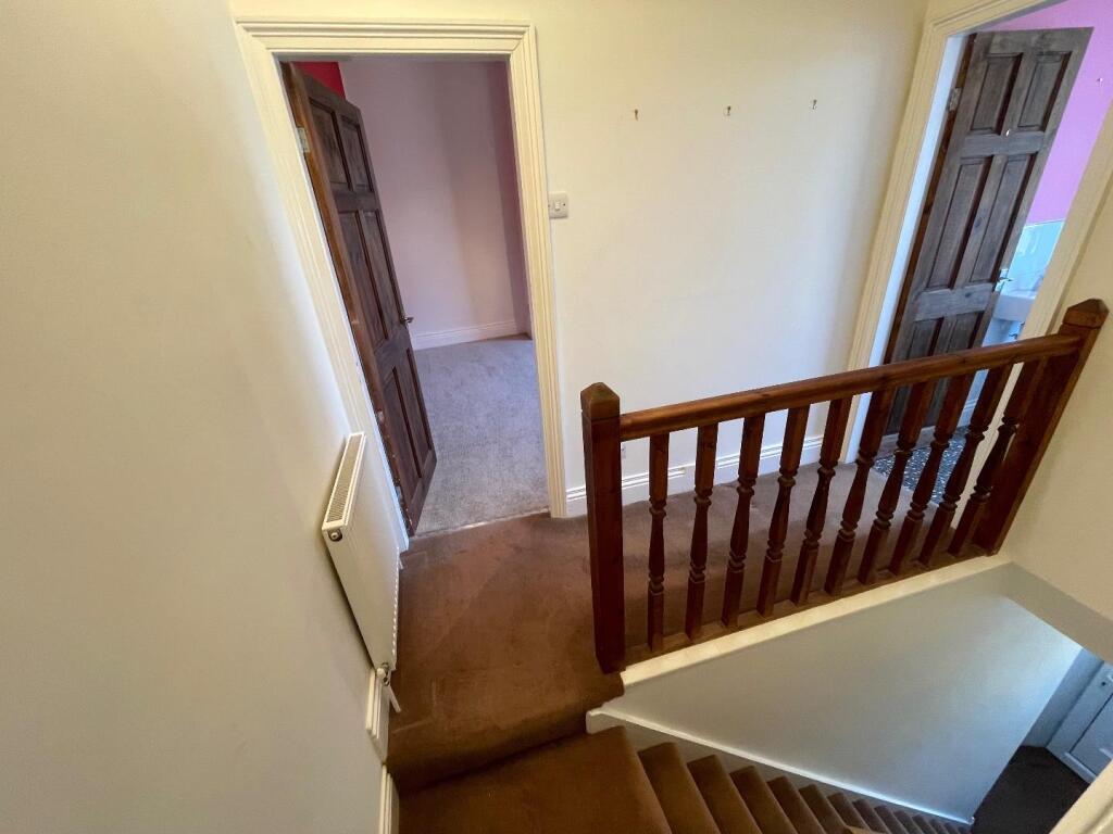TO THE FIRST FLOOR LANDING