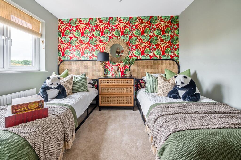 The third bedroom has space for another double bed or two single beds