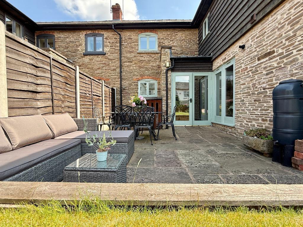 Patio and rear of Rowberry Cottage