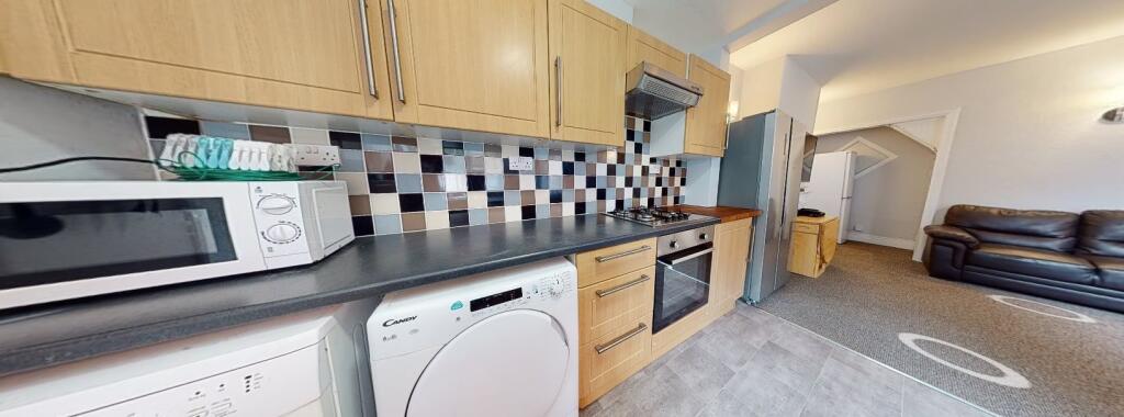 A modern, well-maintained kitchen featuring a m...