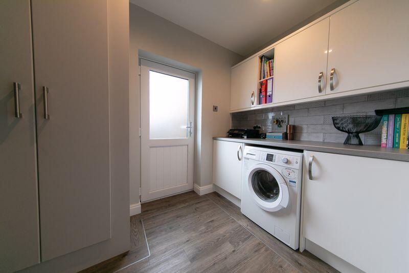 Rear porch &amp; utilities space