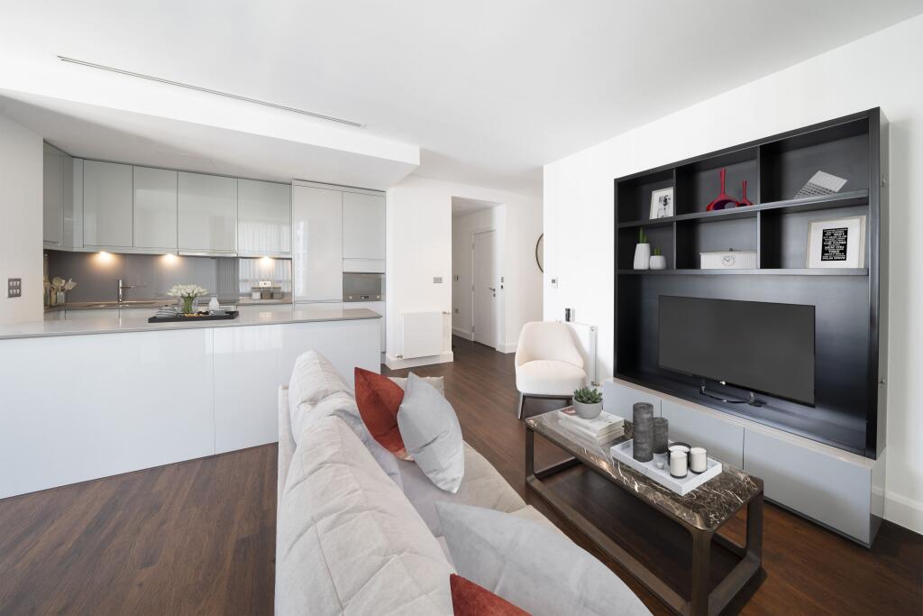 Explore this elegant open-concept space that blends style and comfort effortlessly.