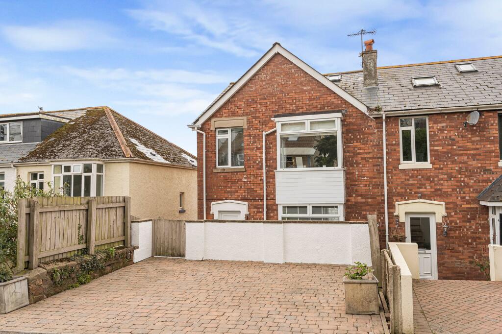 Parking for 2 cars at the front of property