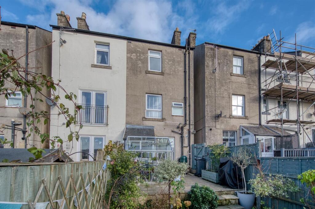 Greenhouse and rear of the home.jpg