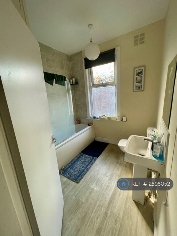 Bathroom With Bath And Shower.