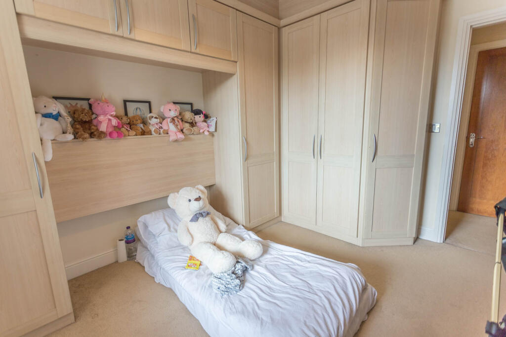 Bedroom 2 with wardrobes