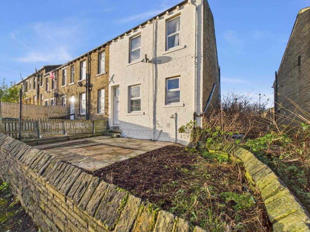 View of Property with Garden