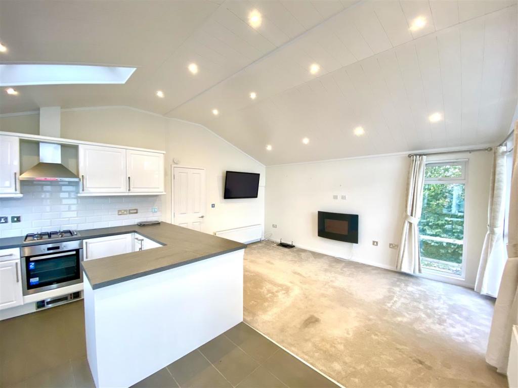KITCHEN/LIVING/DiNING ROOM