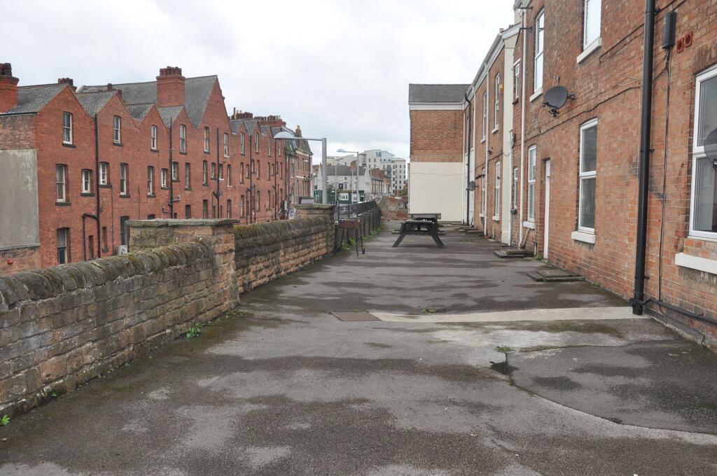 View of the front of a classic brick terraced h...