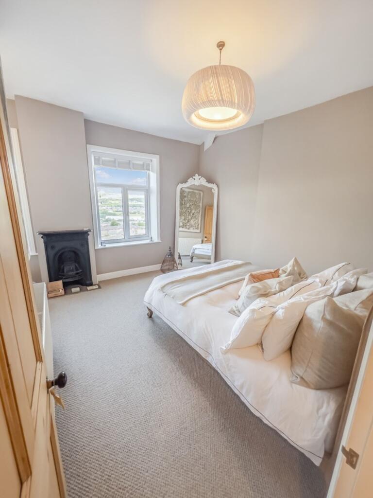 Spacious and Serene Master Bedroom