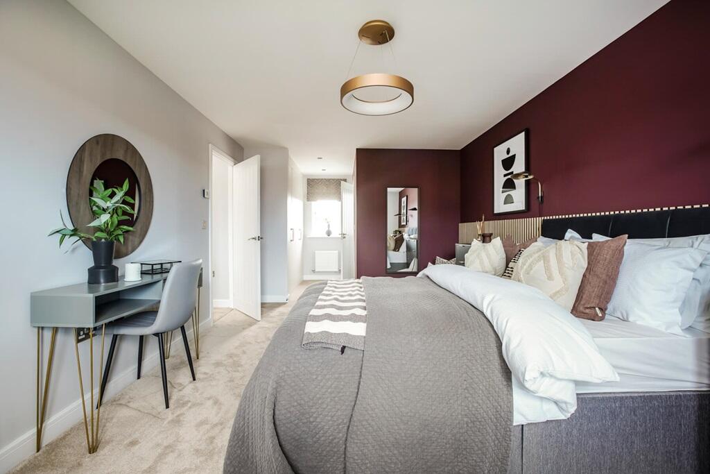 The main bedroom is complete with an ensuite shower room