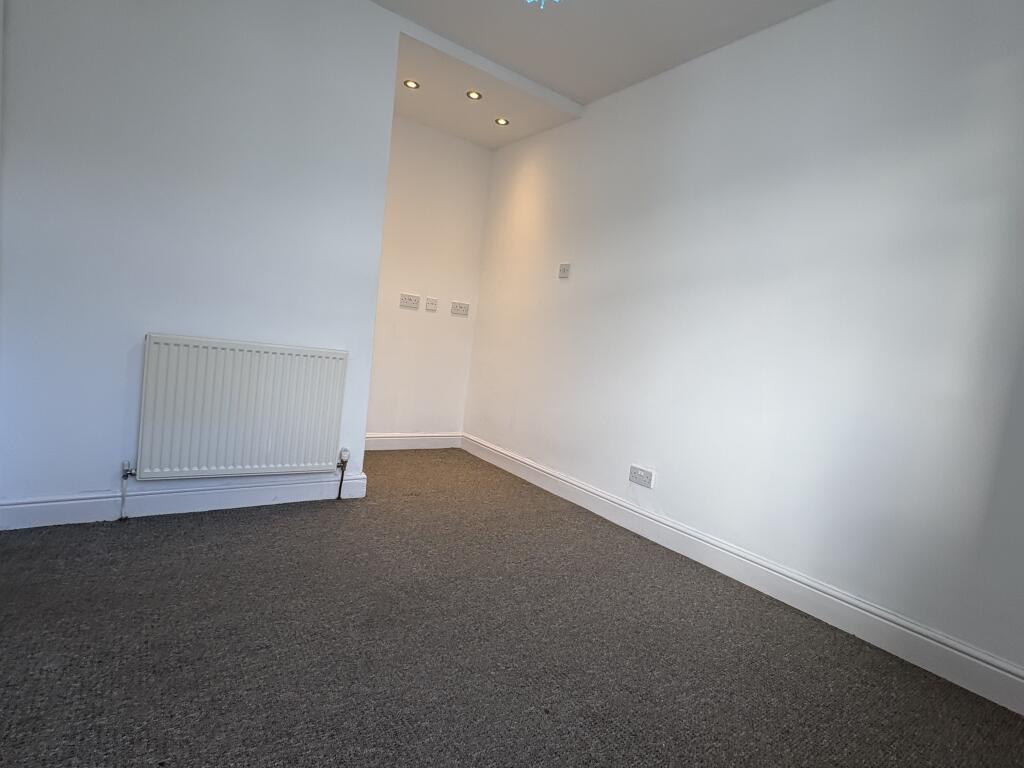 Second bedroom with spotlight desk area