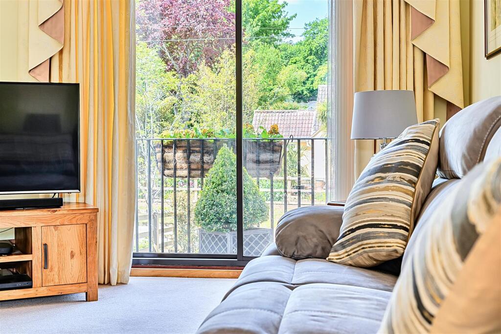 Sitting room looking out on the balcony