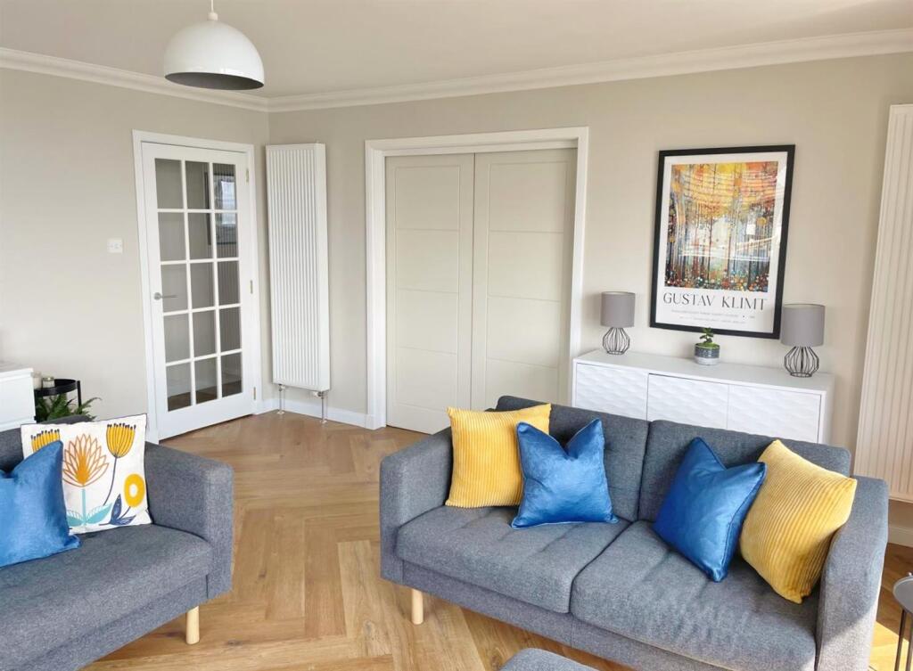 Lounge to hall, pocket doors closed