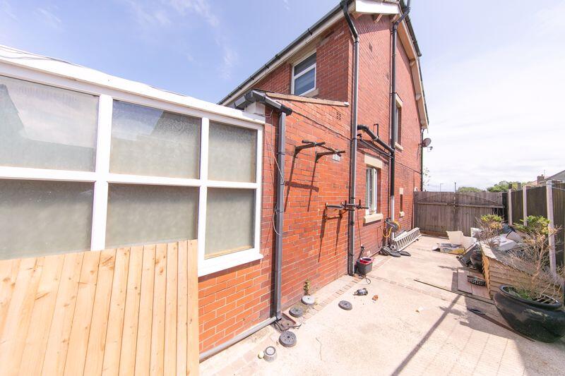 Side elevation and driveway