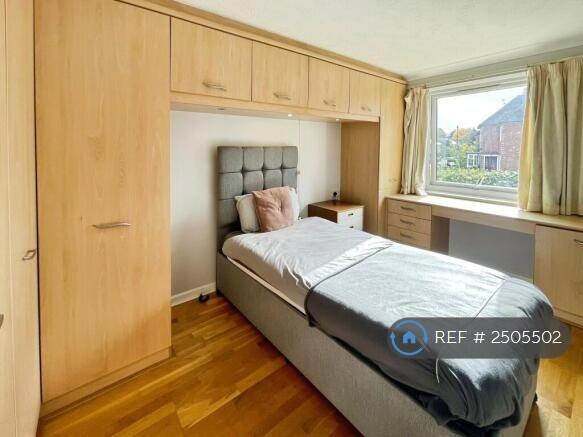 Spacious Bedroom With Fitted Wardrobes