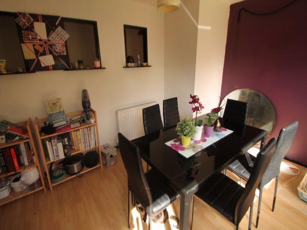 A bright and inviting living room featuring a m...