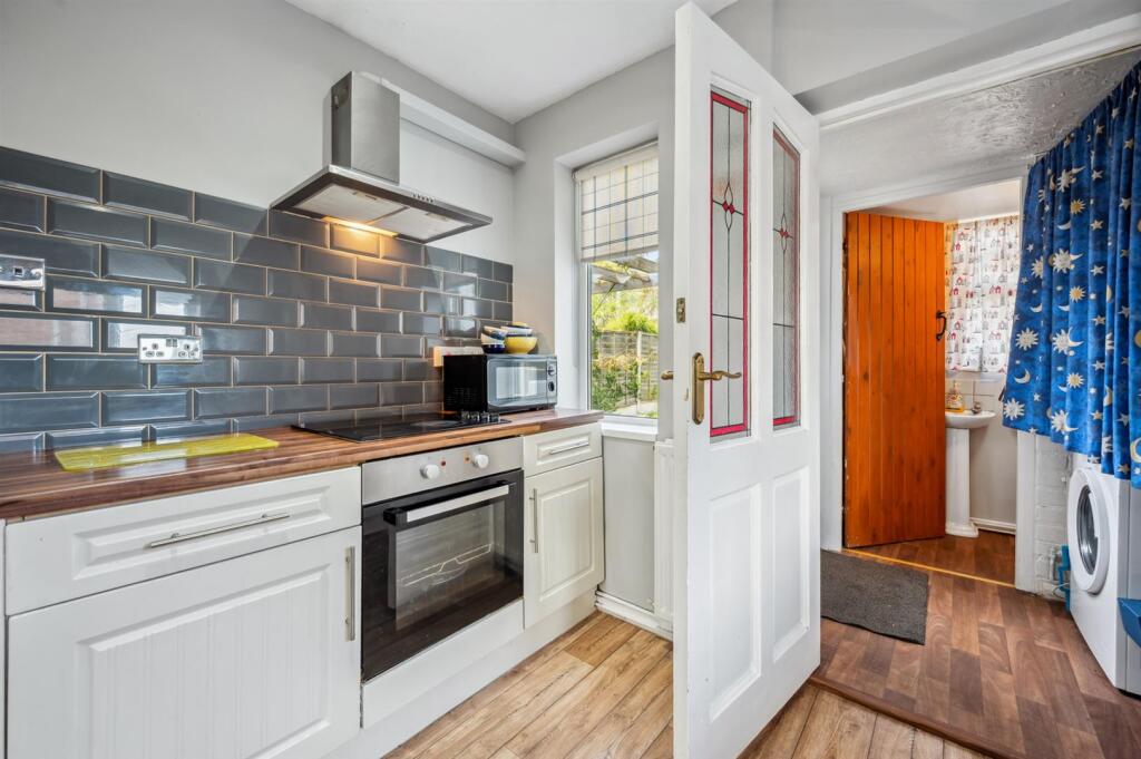 Kitchen to utility room and WC.jpg