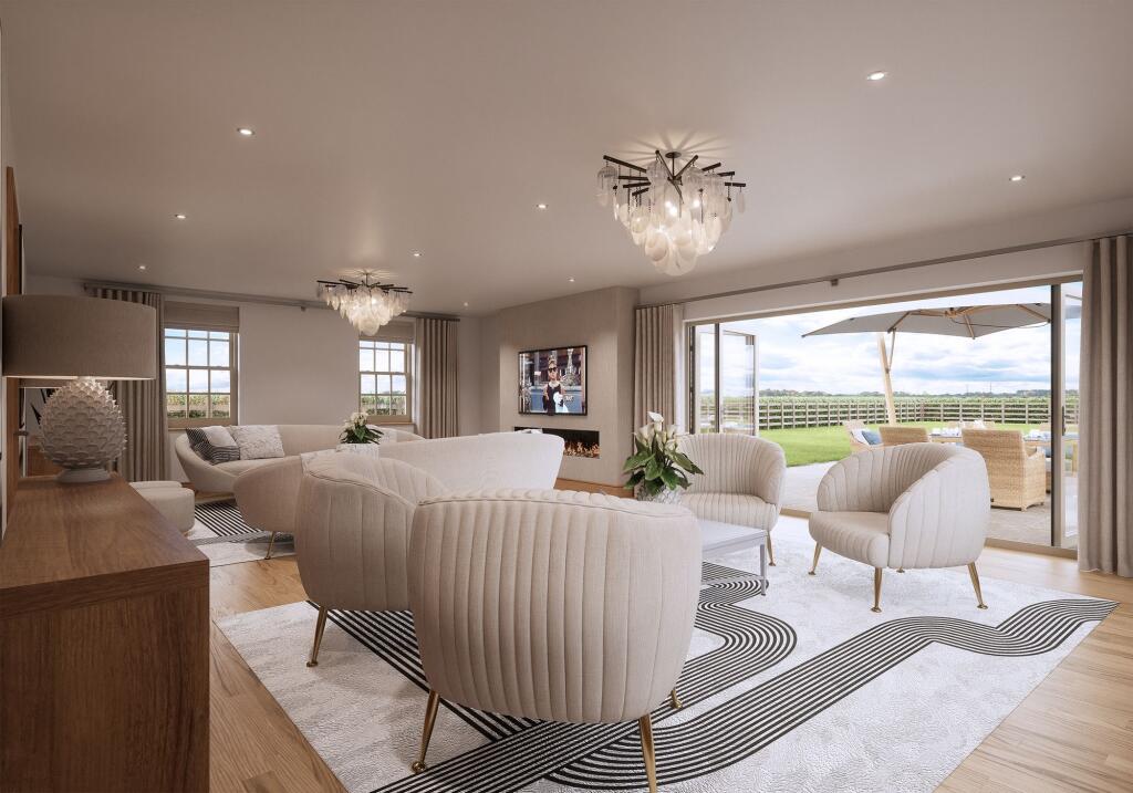 Bi-fold doors onto manicured lawns with uninterrupted countryside views