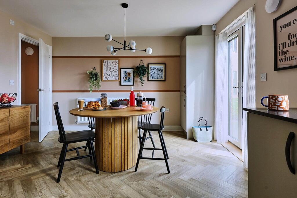 Double doors lead from the dining area to the garden
