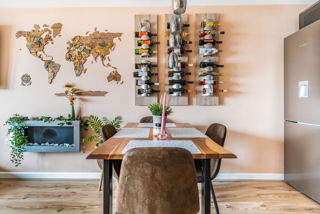 Open plan living space with balcony