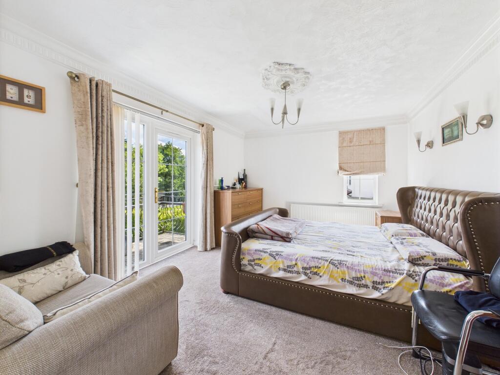 Master bedroom suite with dressing area and en-suite bathroom