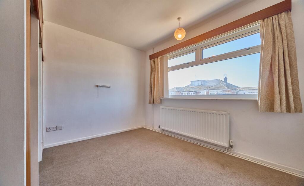 BEDROOM TWO TO FRONT