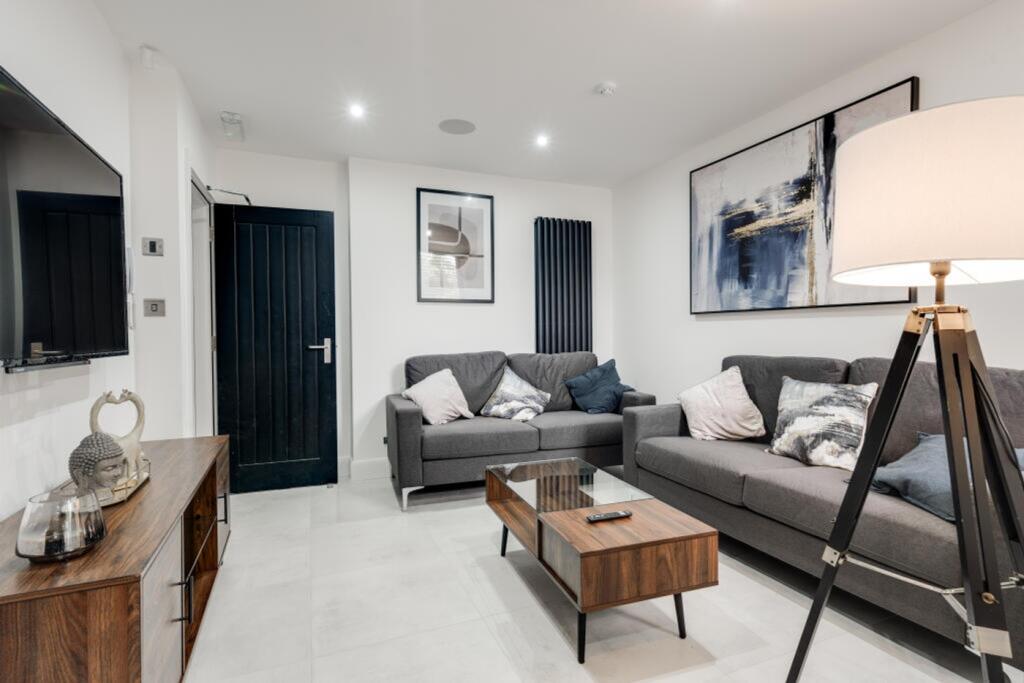 A stylish and spacious modern living room, perf...