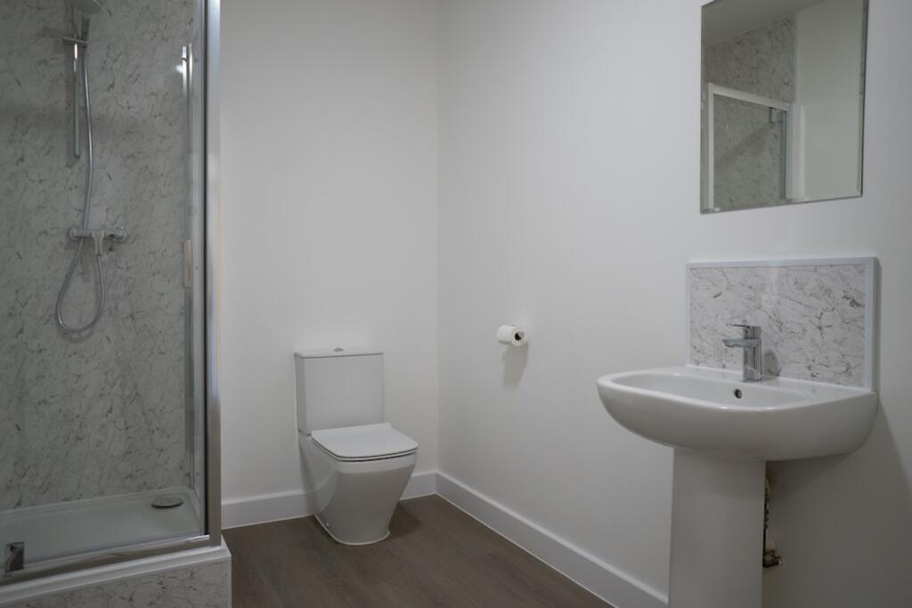 A modern and clean bathroom featuring stylish f...