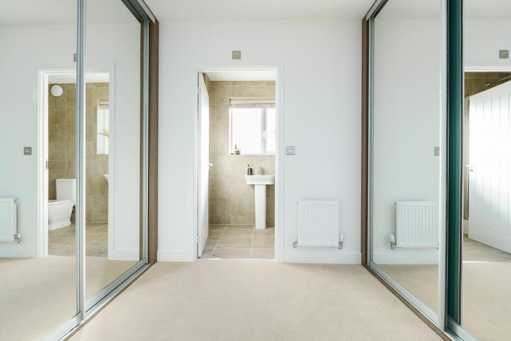 Bedroom one boasts its own dressing area
