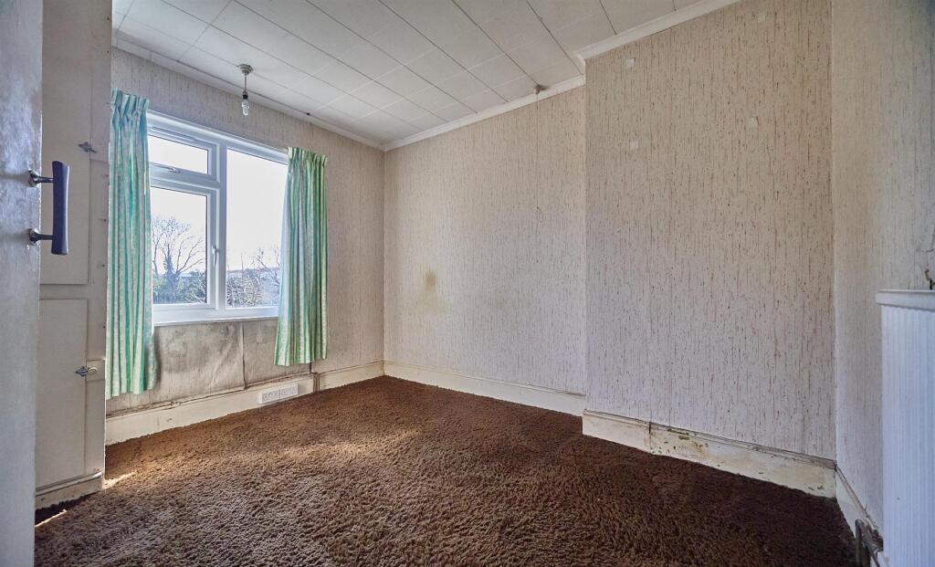 BEDROOM TWO TO REAR