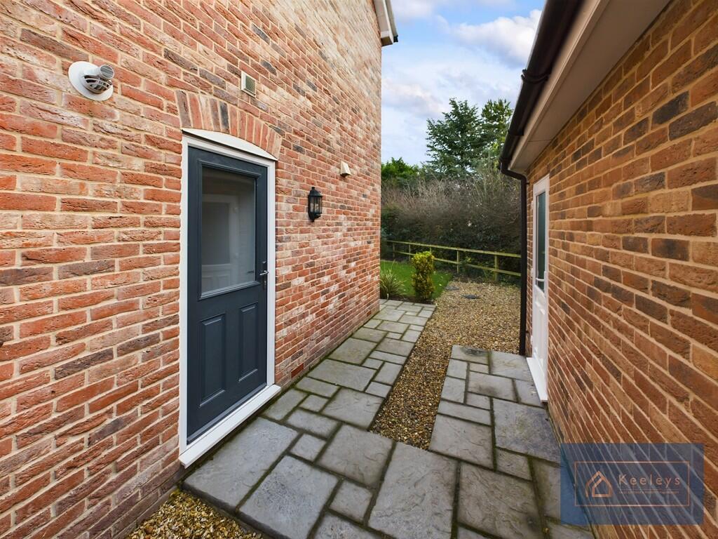 Side of house and...