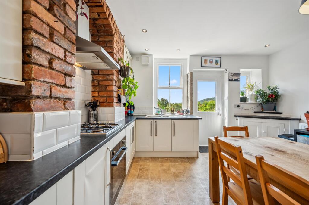 Dining Kitchen to back door.jpg