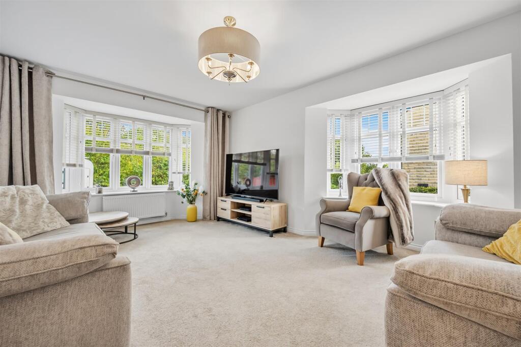 Sitting Room to windows.jpg