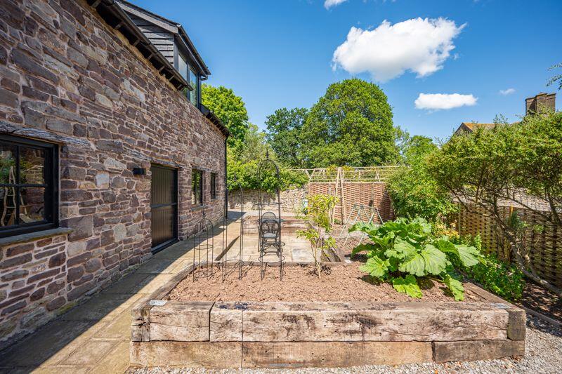 Rear Courtyard and Raised Beds