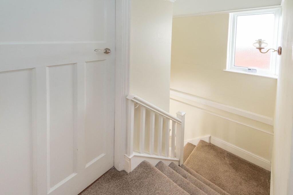 ENTRANCE HALLWAY AND LANDING