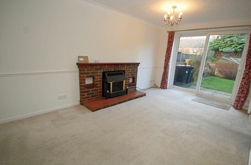 Sitting room with doors to garden