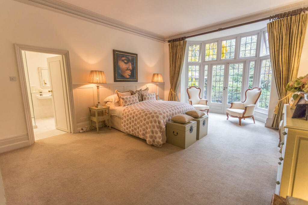 Bedroom 1 with wardrobes