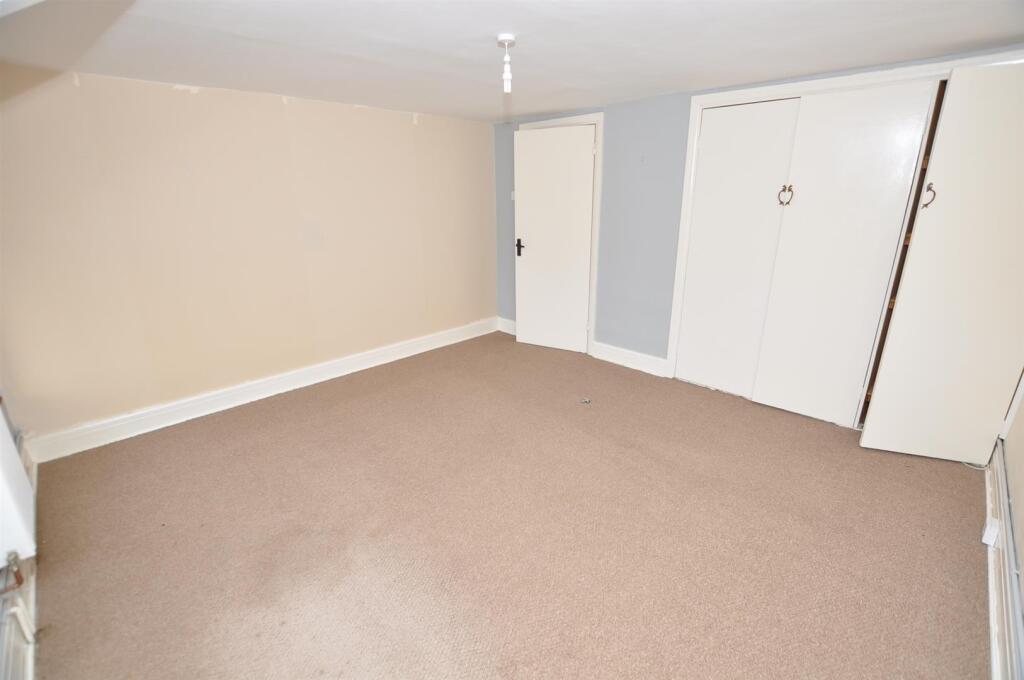 Mezzanine Level Front Bedroom 1