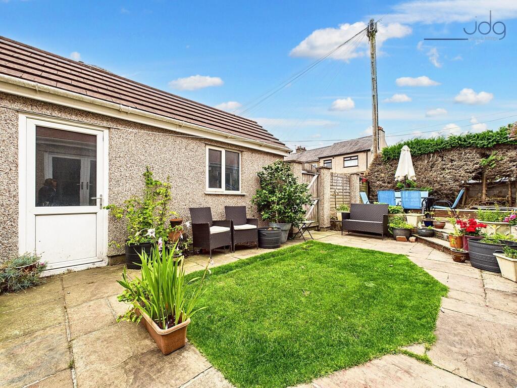 South West Garden with Garage entrance