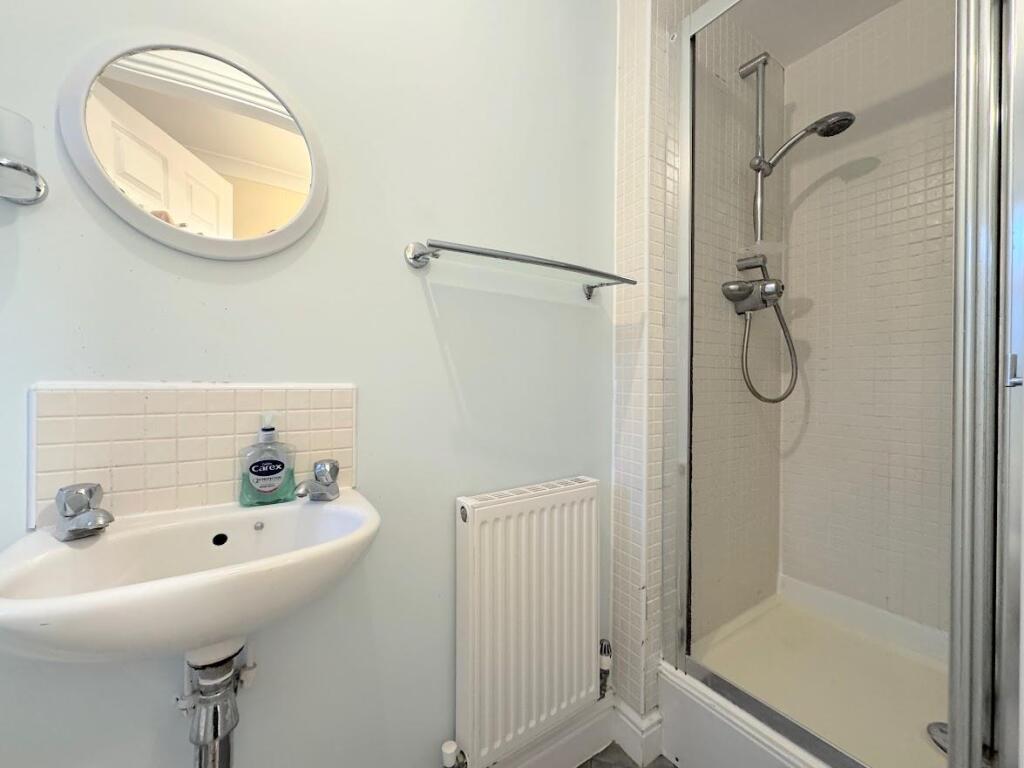 CLOAK AND SHOWER ROOM