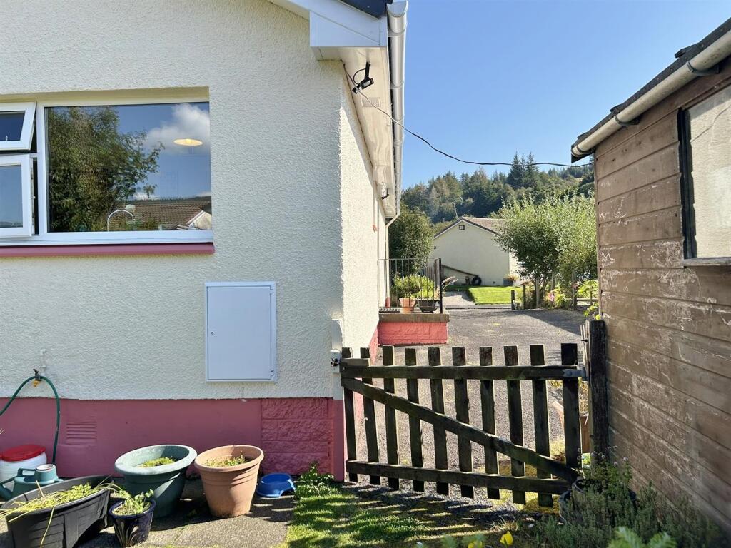 Enclose rear garden