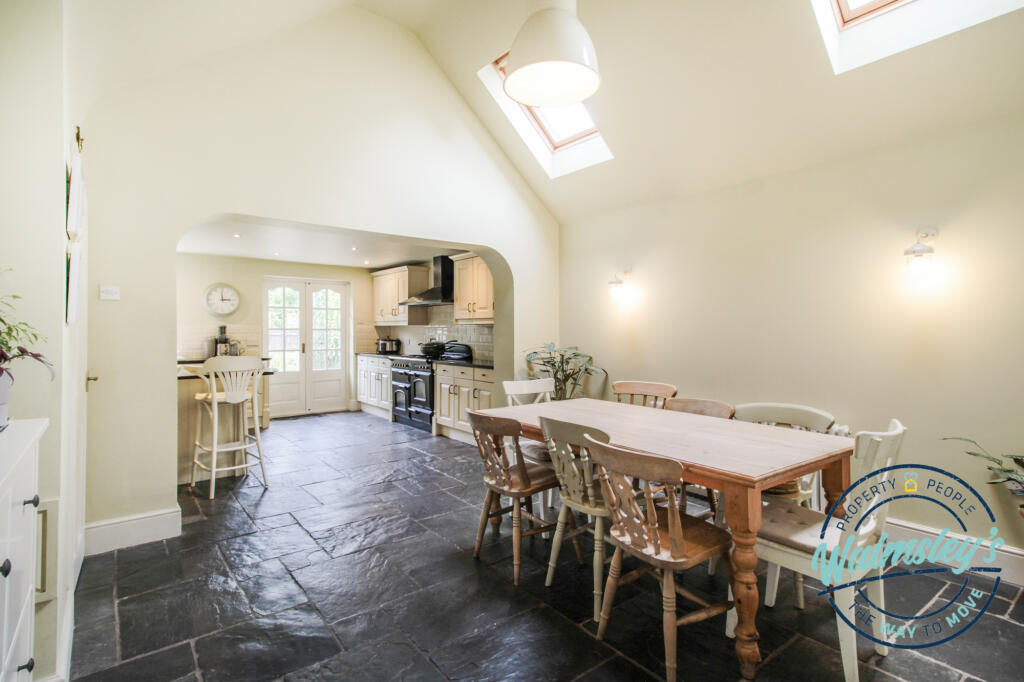 Kitchen dining to right wing